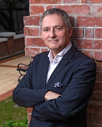 Prof Chris Webster